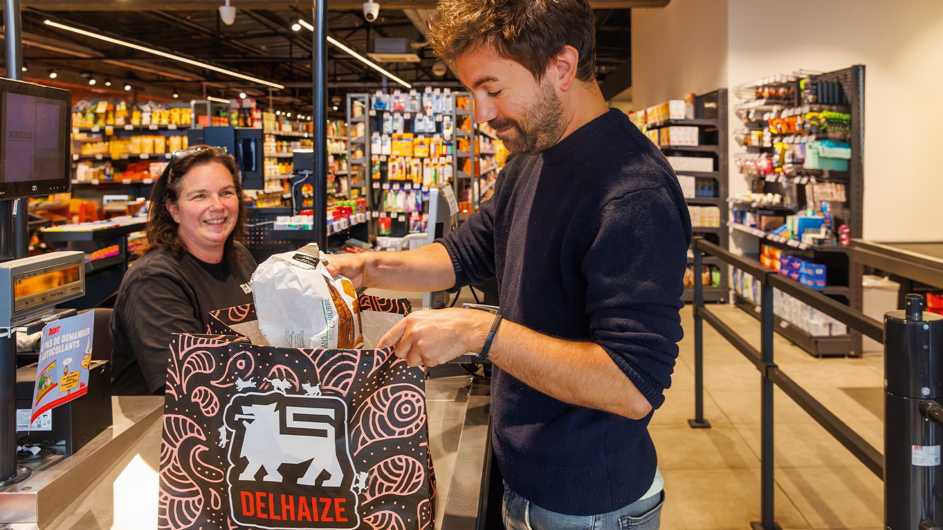 A man paying for his groceries