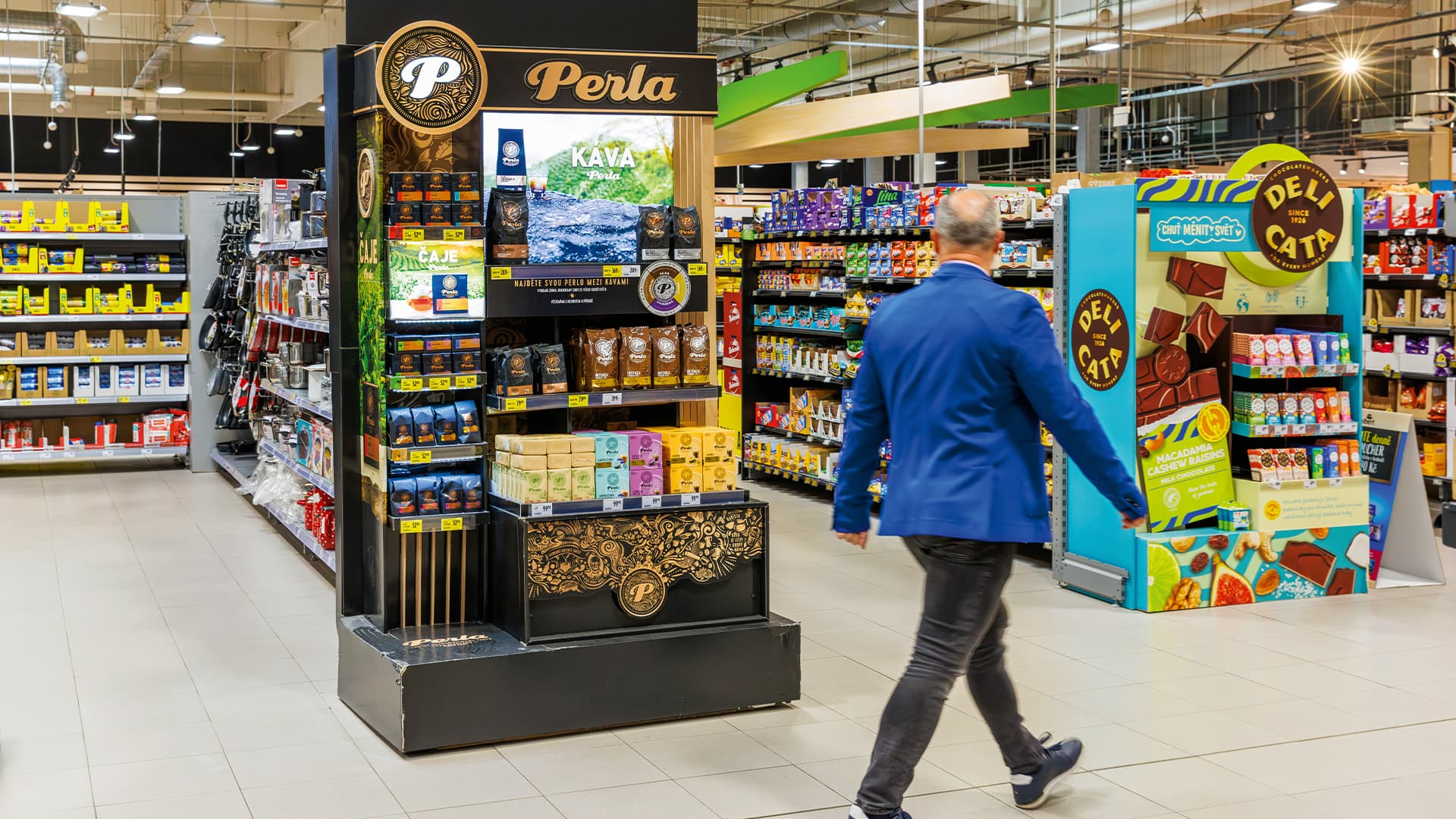 A woman walking through a supermarket